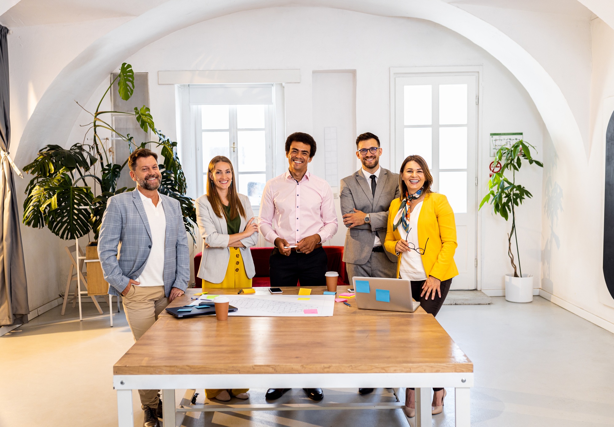 Portrait of diverse group of business people in office.