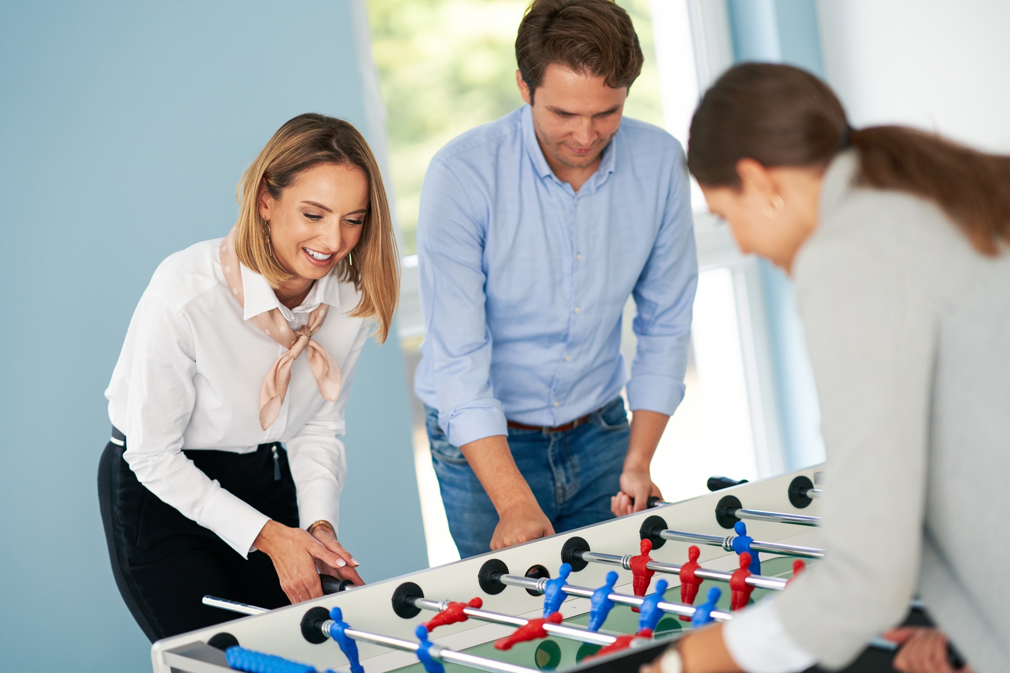 Business people relaxing in shared office space