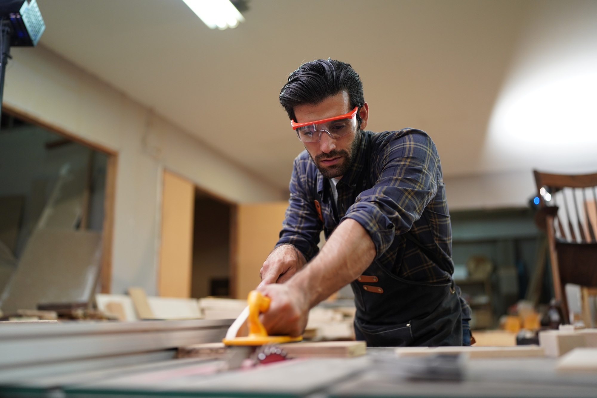 Carpenters Assembling Furniture, small business workshop office background.