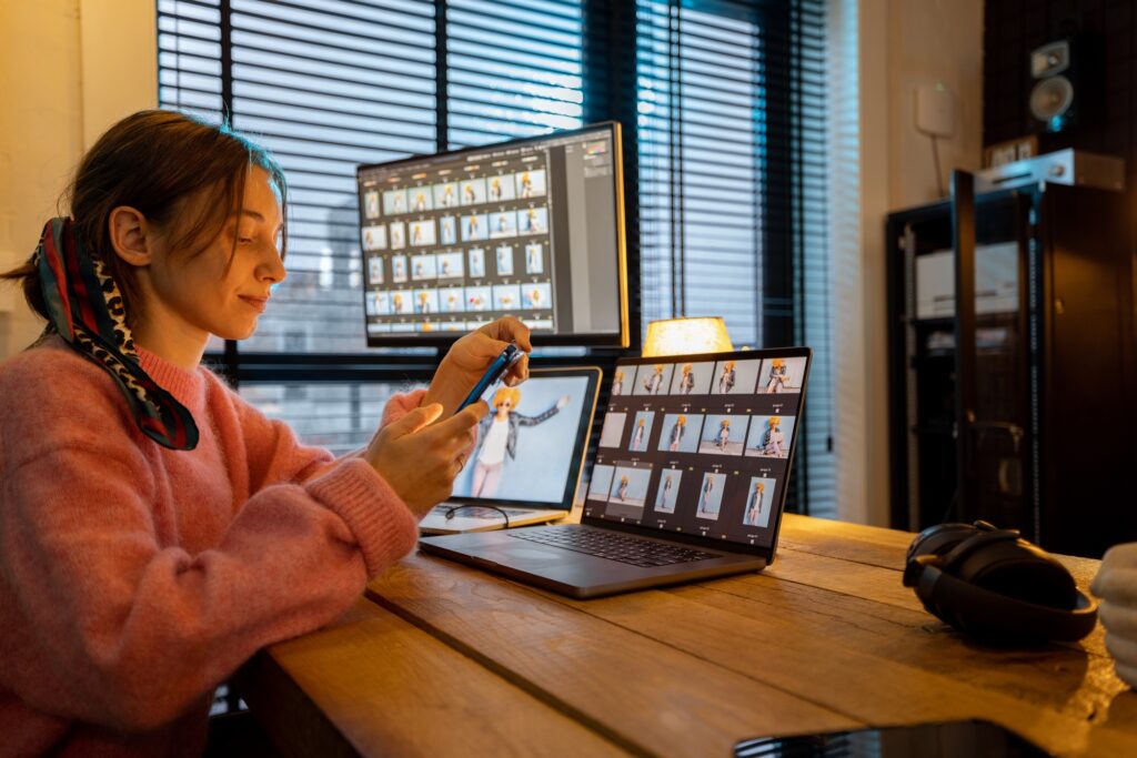 Photographer editing photos at home office