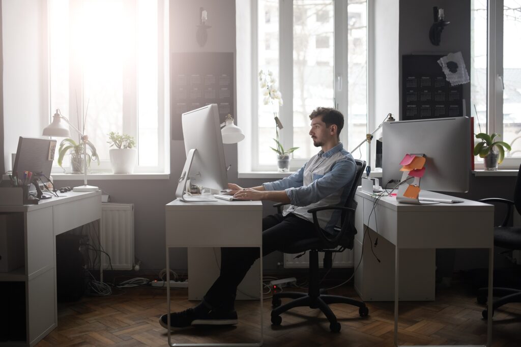 A man working in a modern design office